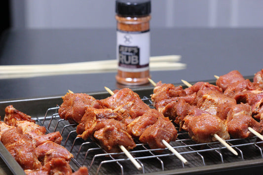 Using the Original Rub on pork butt skewers
